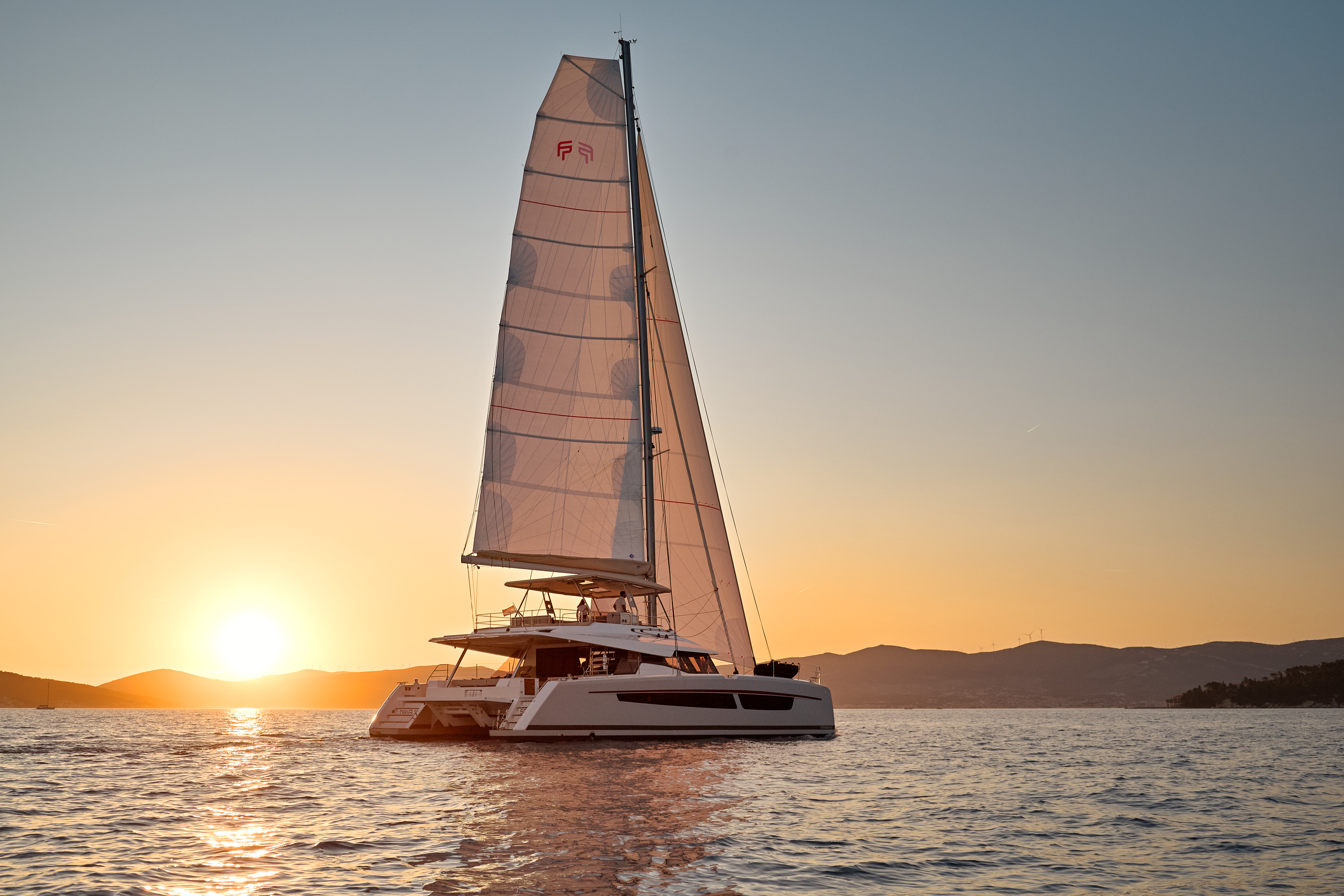 NIKA I sailing at sunset, Adriatic coast